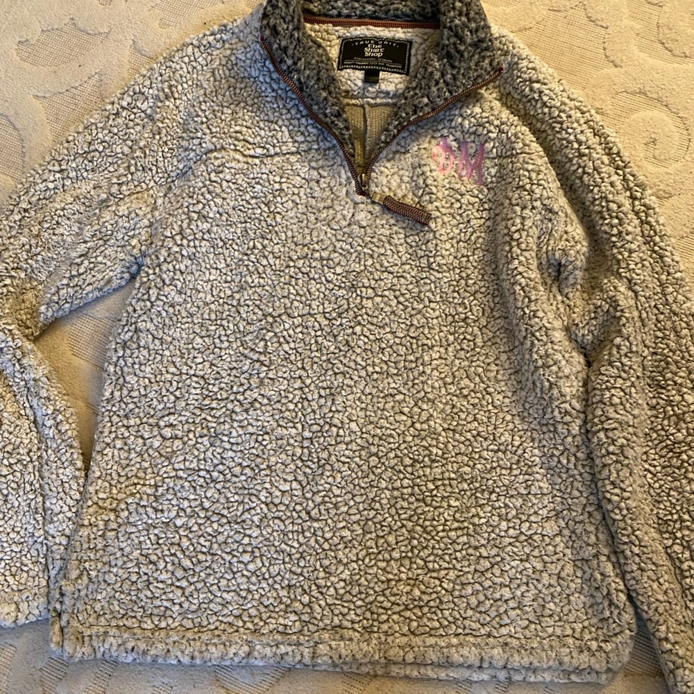 True Grit Pullover with Phi Mu Monogram on it